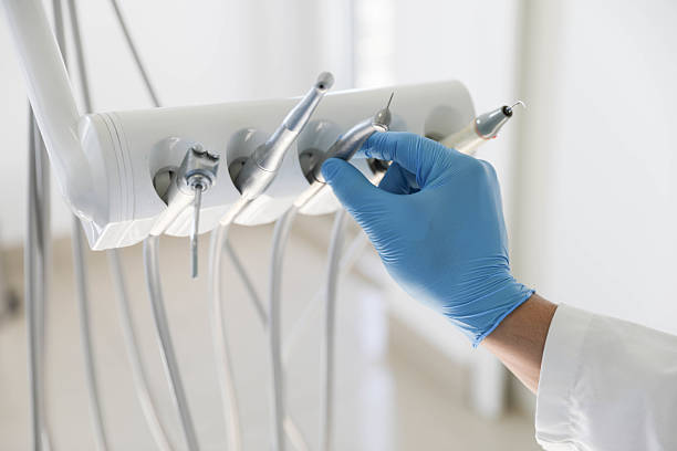 Professional Tooth Extraction technician working in Portland, ME